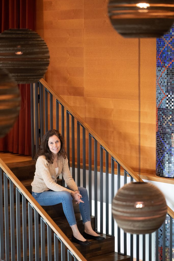 Sitting on a stair, woman