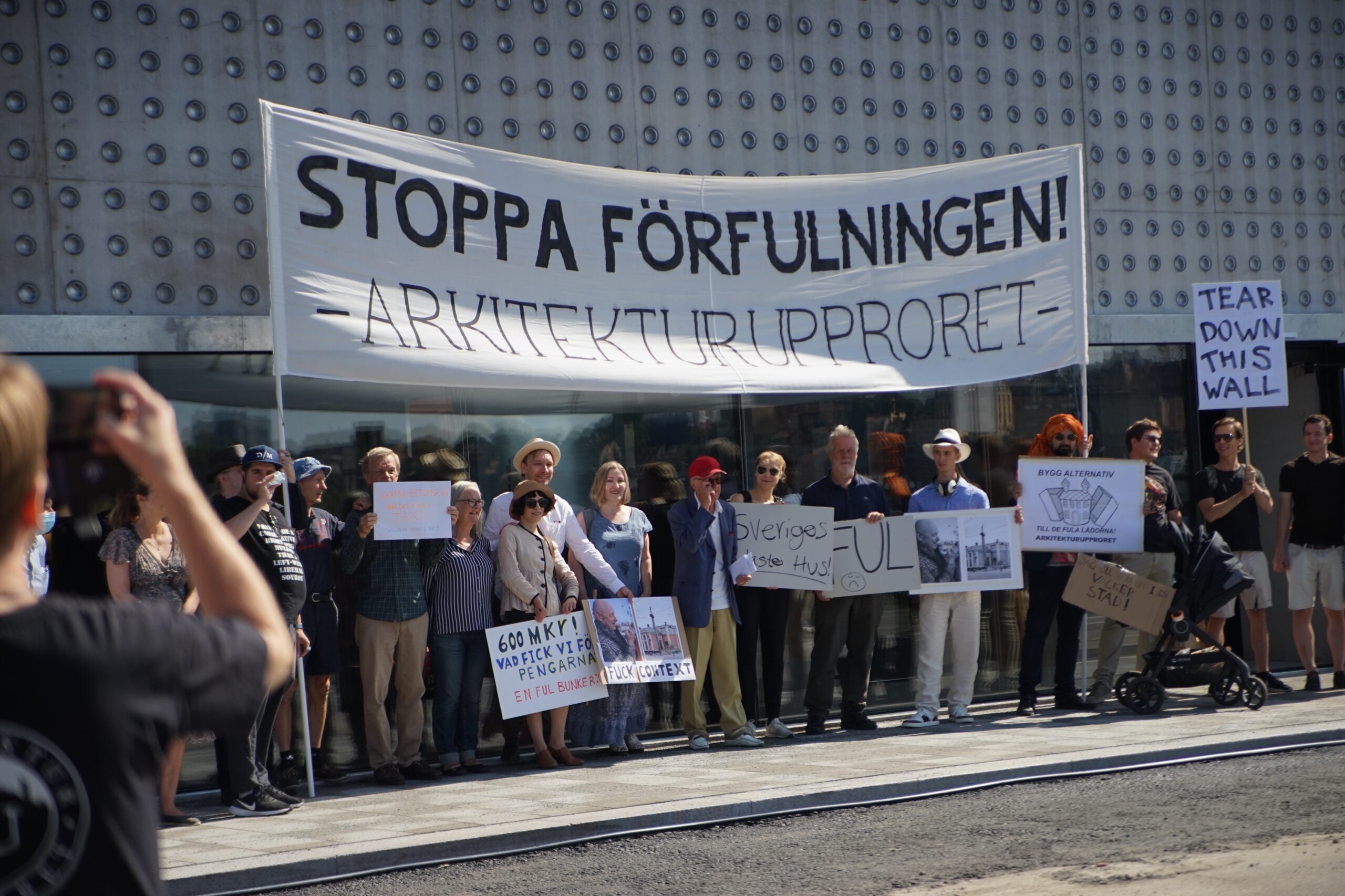 Outside the bunker, the architectural uprising held a demonstration.