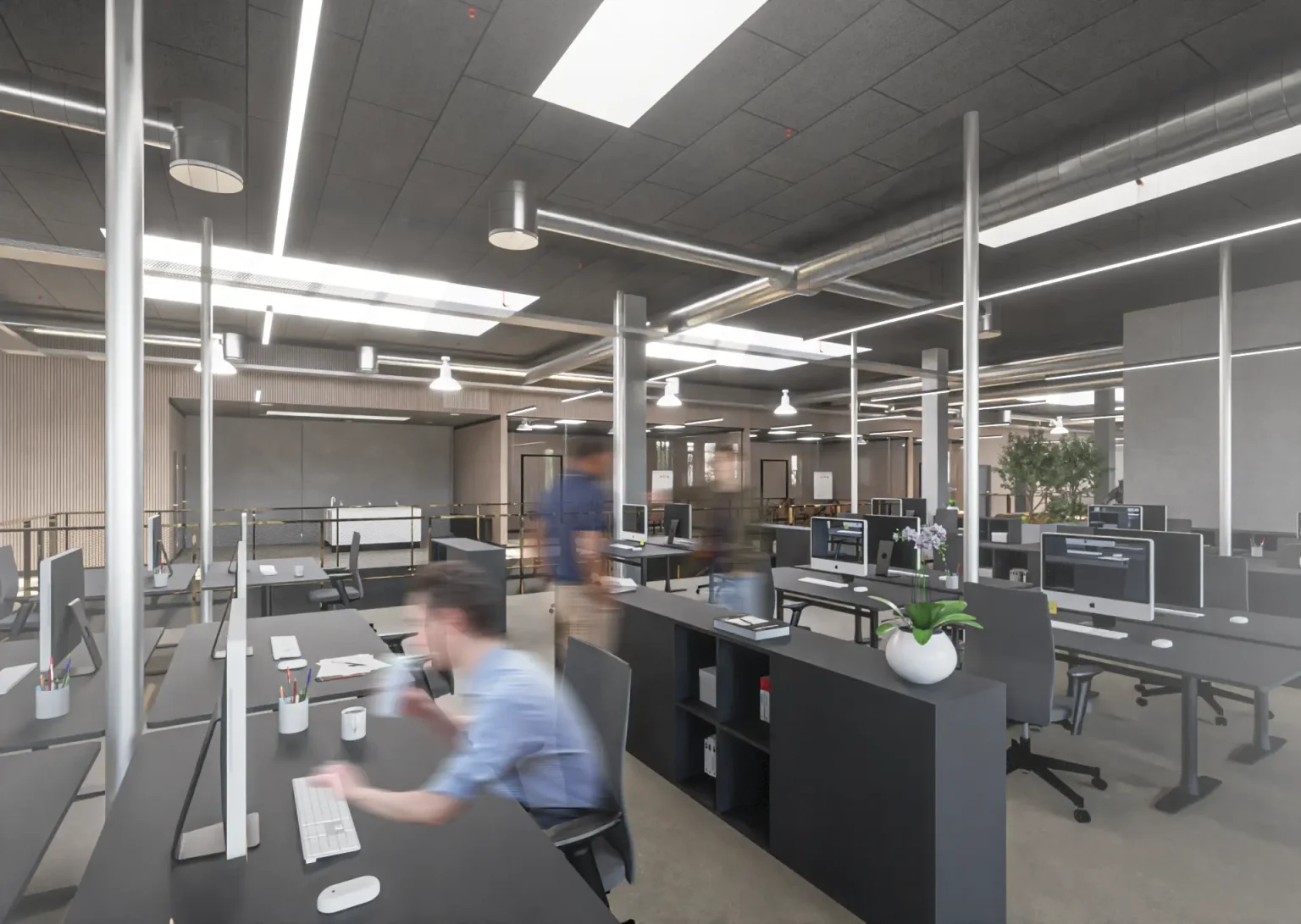 Åbent kontorlandskab med arbejdsstationer og ovenlys i Coolshops nye administrationsbygning i Nørresundby