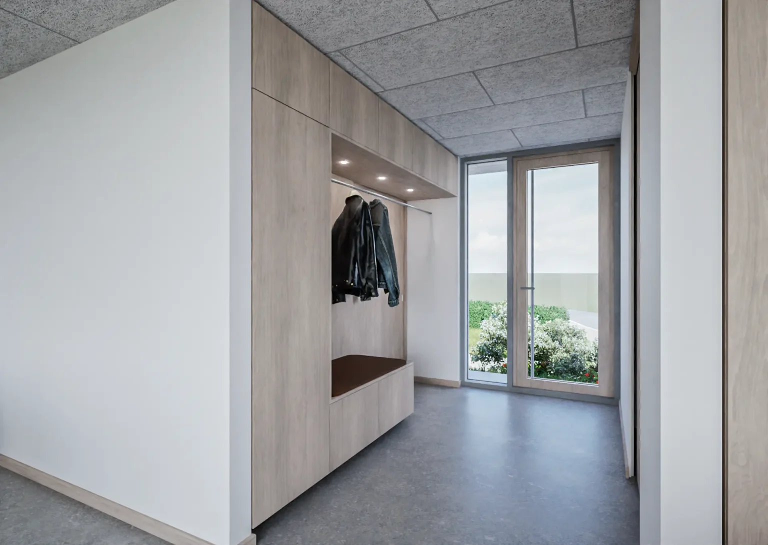 Entréområde med garderobe og integreret siddeplads i træ.