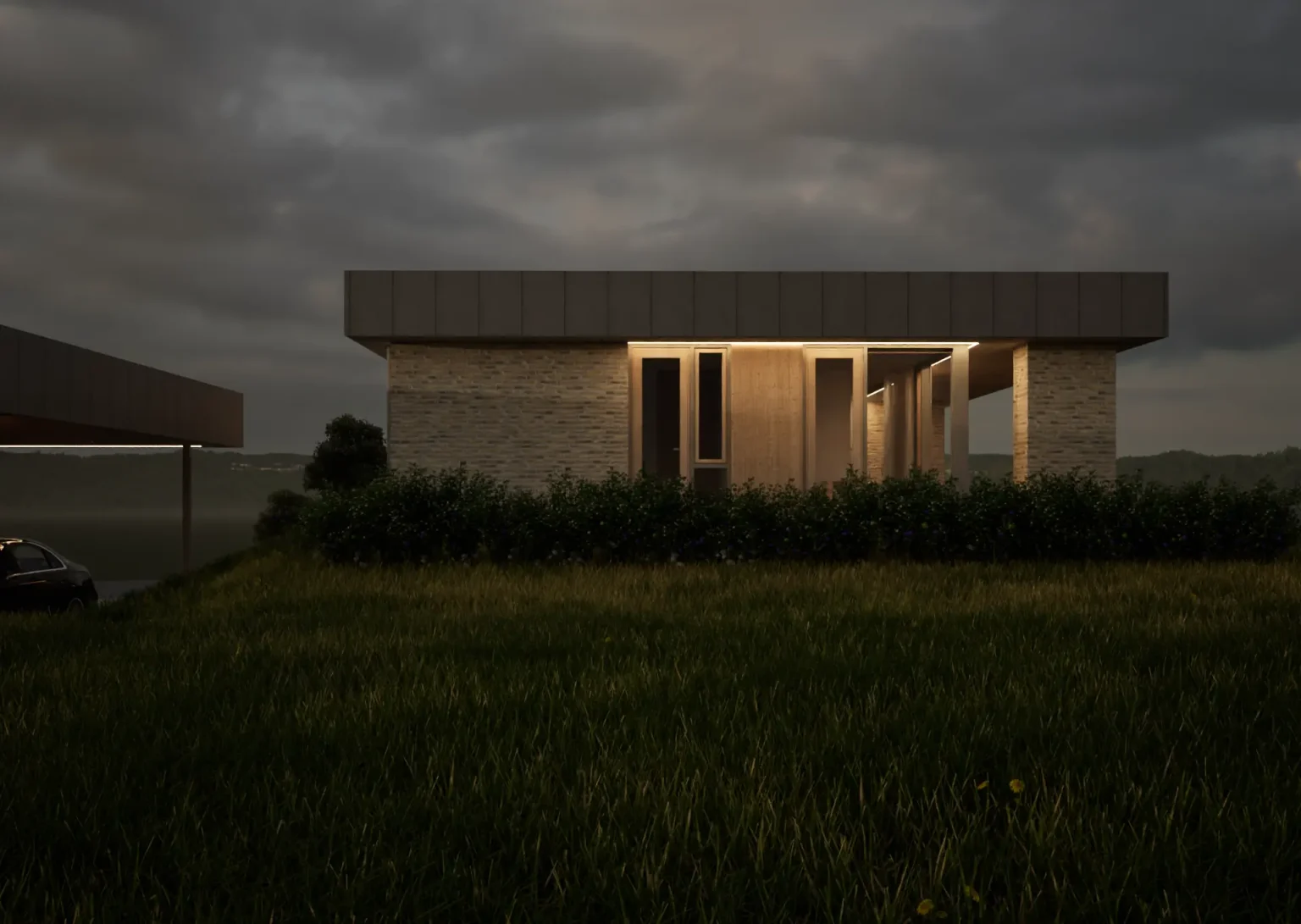 Villa Grævlingen set fra landskabet i aftentimerne med varme lys fra boligen.