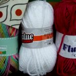 Three bundles of wool in the Art and Craft valley Window
