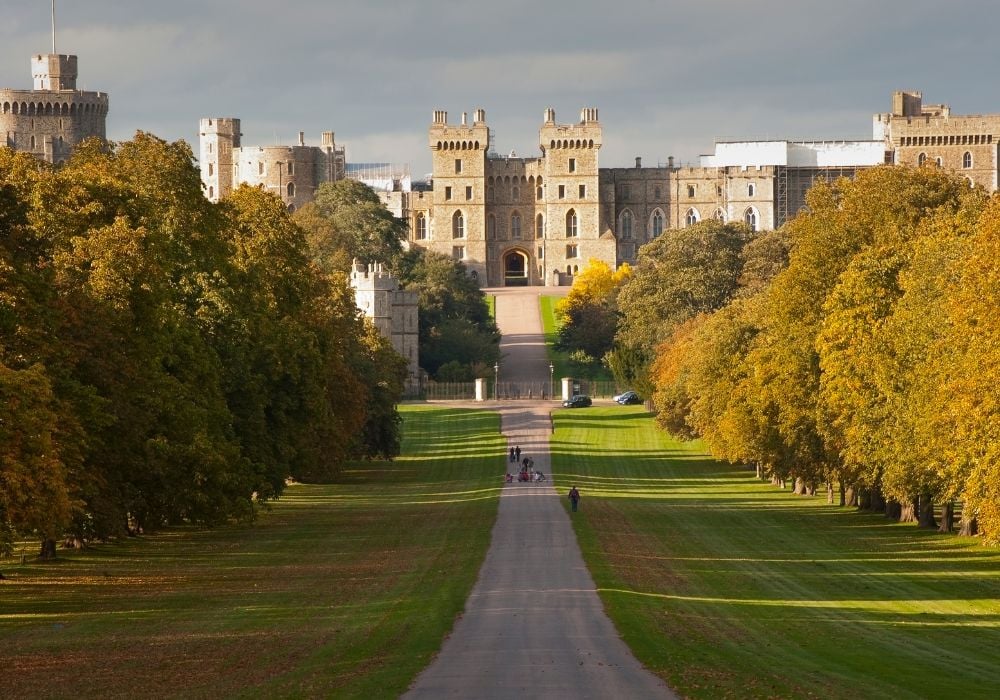 Windsor Castle seen along the Long Walk in Windsor Great Park in England.