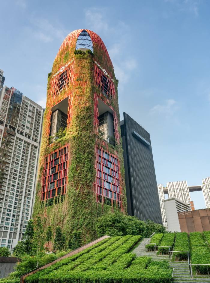 The plant-covered tower of Oasia Hotel Downtown