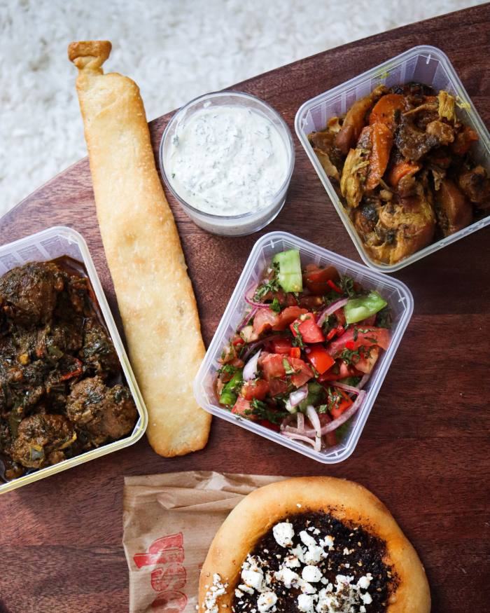 A selection of dishes to takeaway, as well as bread and a dip, at Shosh