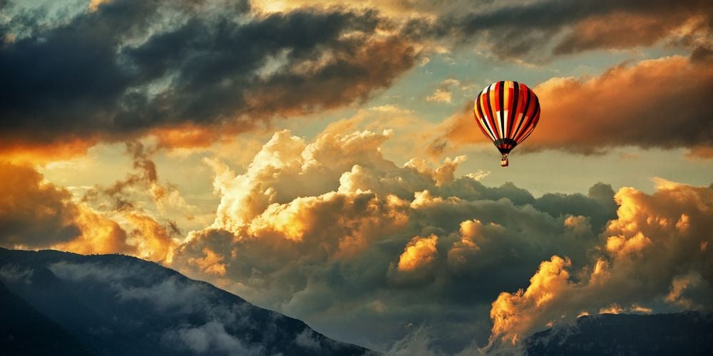 Hot air balloon high above the mountains surrounding San Miguel de Allende