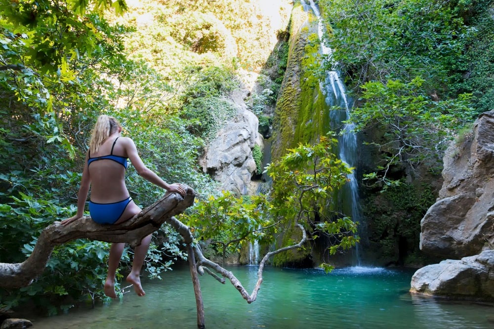 Taking a swim in a pool below a waterfall in the Gorge of Richtis, Crete