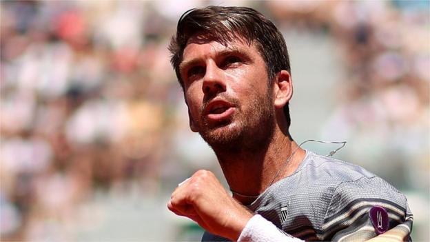 Cameron Norrie celebrates against Benoit Paire in the French Open