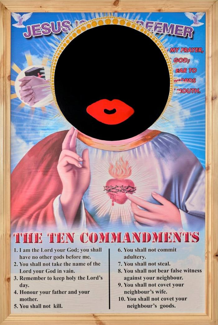 A religious poster has been altered with the addition of a black circular head with a bright red mouth