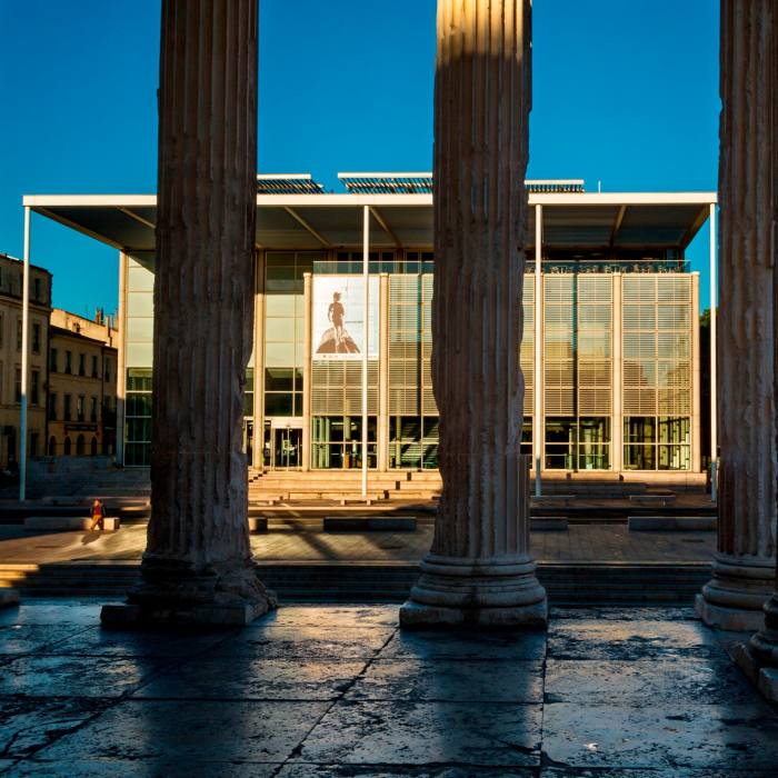 A building seen through three pillars