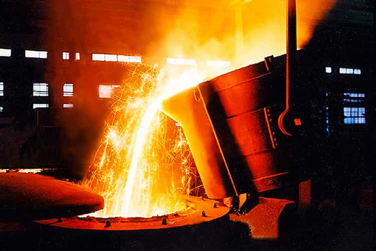 large bowl of molten metal at a steel mill. Steel production.
