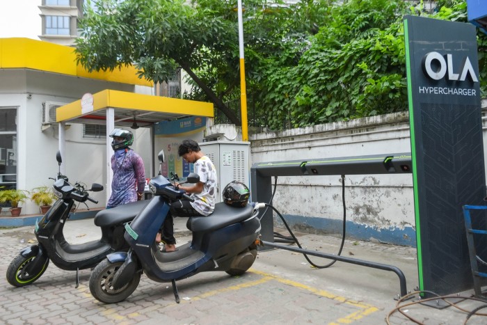 Ola e-scooters charging at one of its stations in Kolkata