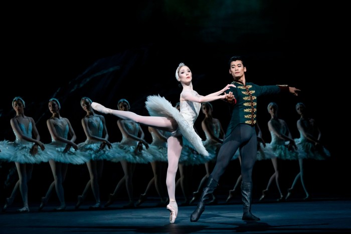 The male and female leads of ‘Swan Lake’ at the ROH, with a row of ballerinas behind them