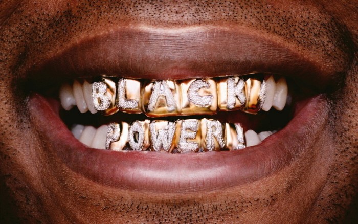 ‘Black Power’, 2008, by Hank Willis Thomas: a photo of a man’s teeth, with ‘Black Power’ spelt out in diamonds, one letter per tooth