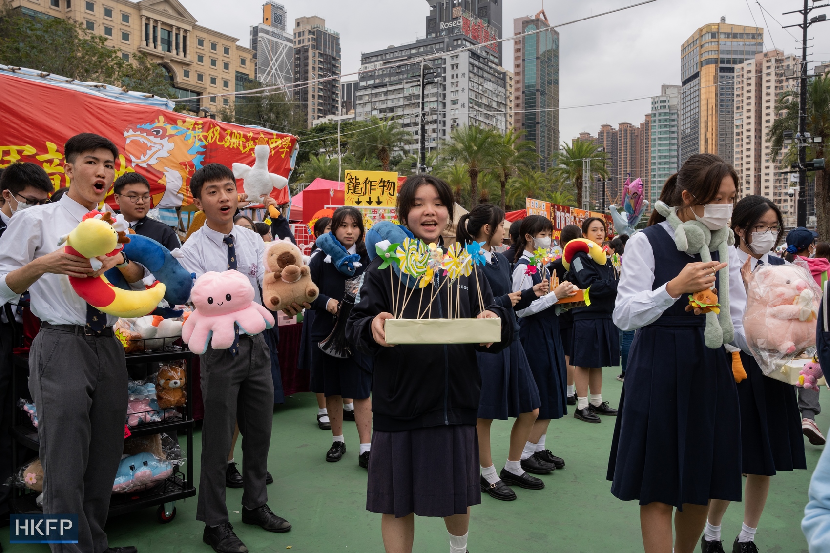 Students at a Lunar New Year Fair in Causeway Bay's Victoria Park, in Hong Kong, on February 5, 2024. Photo: Kyle Lam/HKFP.