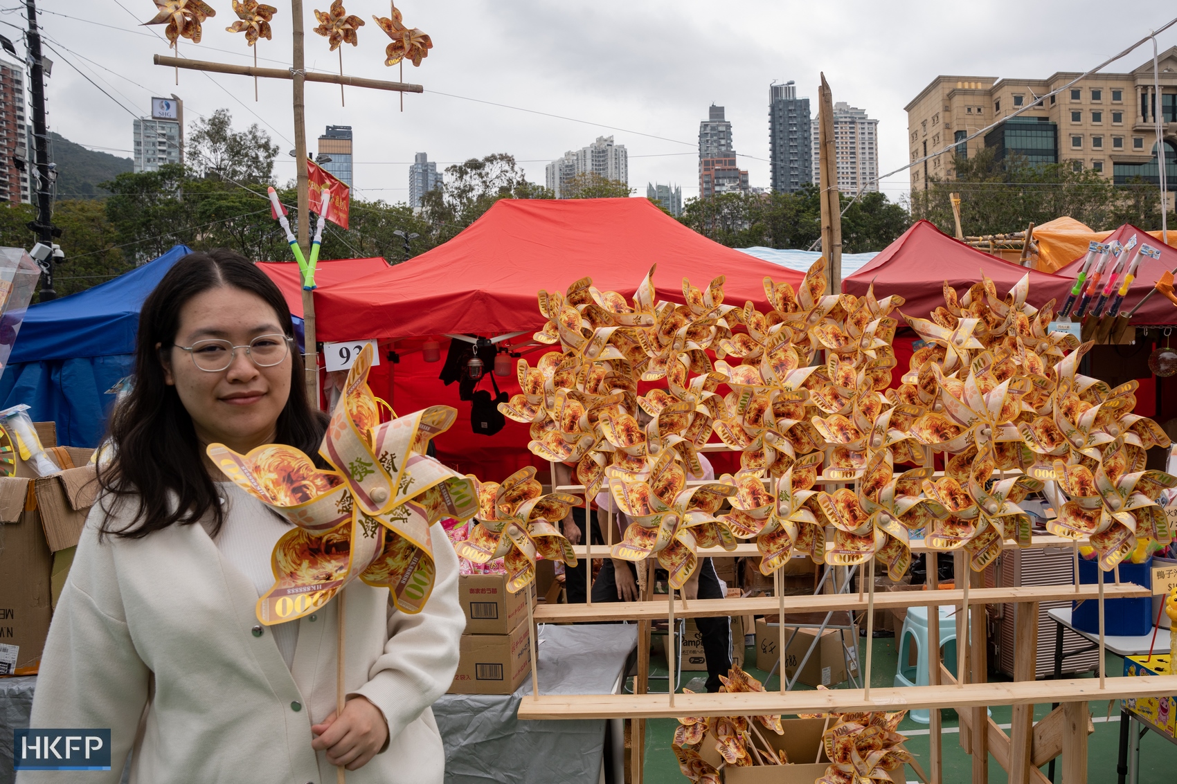 A woman at a Lunar New Year Fair in Causeway Bay's Victoria Park, in Hong Kong, on February 5, 2024. Photo: Kyle Lam/HKFP.