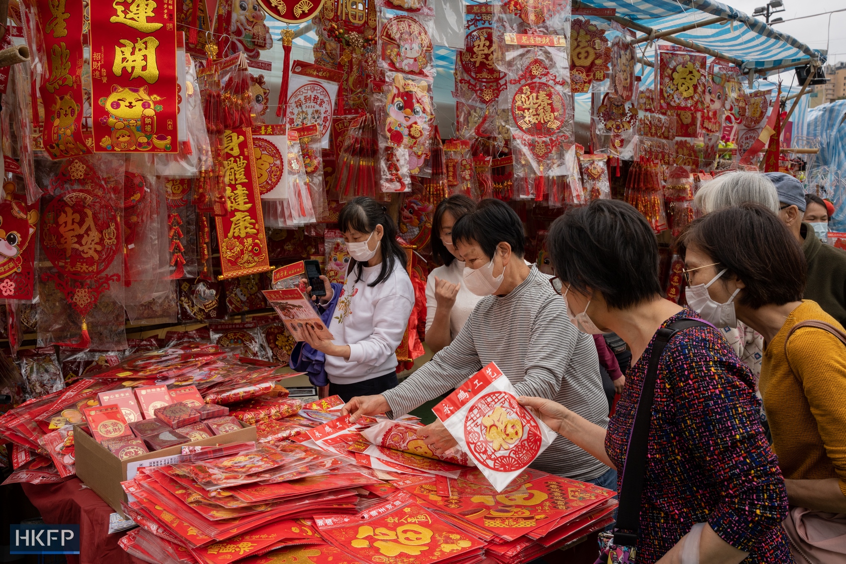 People at a Lunar New Year Fair in Causeway Bay's Victoria Park, in Hong Kong, on February 5, 2024. Photo: Kyle Lam/HKFP.