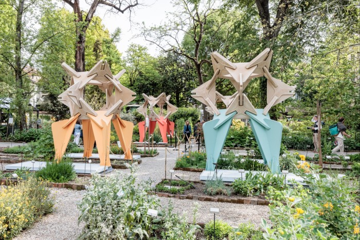 ‘SunRICE: The Recipe for Happiness’ by the CRA-Carlo Ratti Associati studio and the recently deceased Italian architect Italo Rota in the Brera Botanical Garden: orange, blue and red geometric sculptures surrounded by trees
