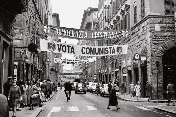 Banners for political parties on Via dei Calzaiuoli before the 1960 election