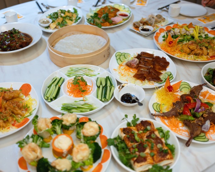 A selection of Hakka Cuisine’s dishes, including Peking duck, lamp chops, stuffed tofu and crispy fried squid