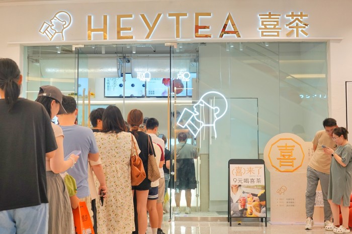Customers queue at a Heytea shop in Yantai, China