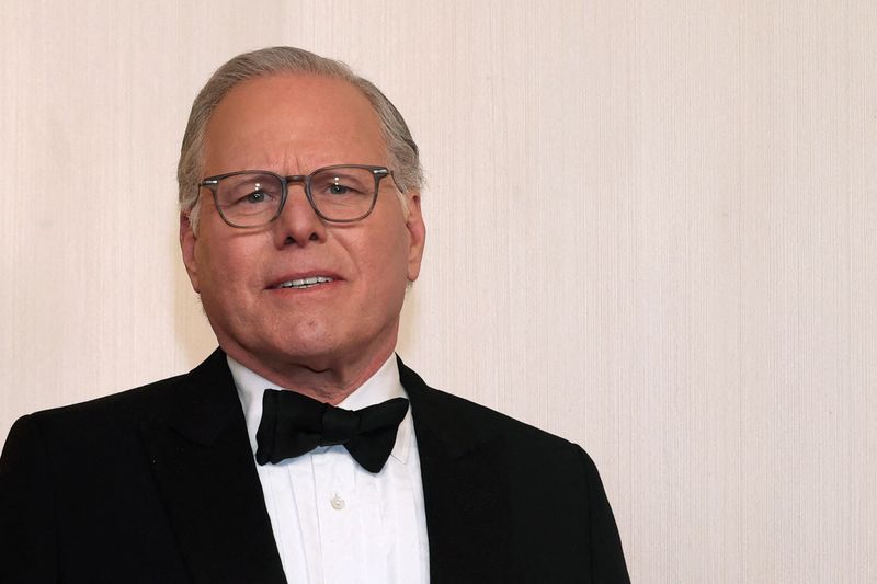 © Reuters. FILE PHOTO: Warner Bros. Discovery chief executive David Zaslav poses on the red carpet during the Oscars arrivals at the 96th Academy Awards in Hollywood, Los Angeles, California, U.S., March 10, 2024. REUTERS/Aude Guerrucci/File Photo