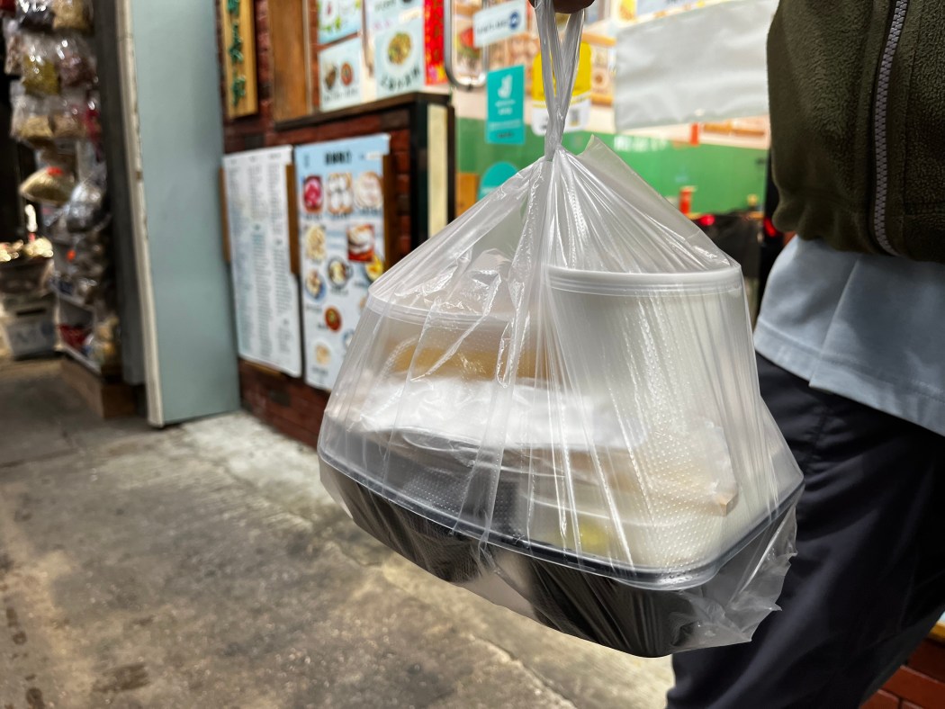 A customer's takeout order, contained in plastic and Styrofoam boxes. Photo: James Lee/HKFP.