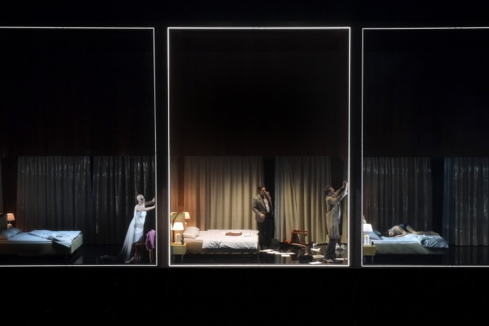 A scene from Oper Frankfurt’s new staging of Wagner’s ‘Tannhäuser’: a triptych of three bedrooms, with different performers in each of them