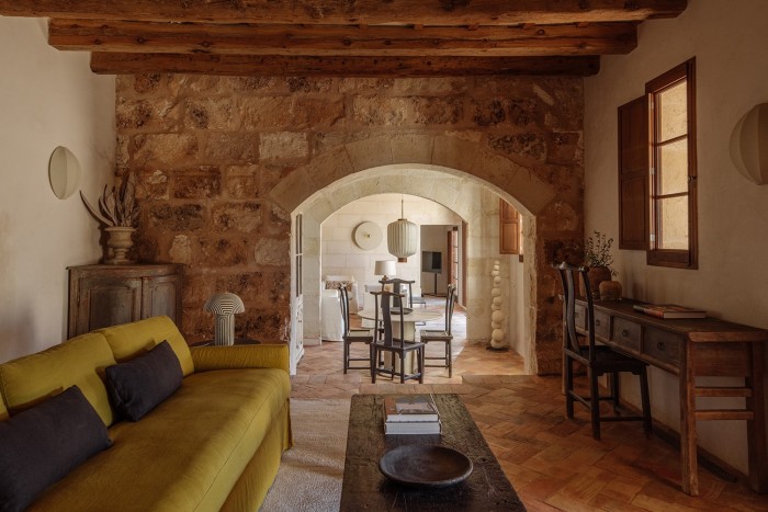 The property offers metre-thick stone walls and cotto floors