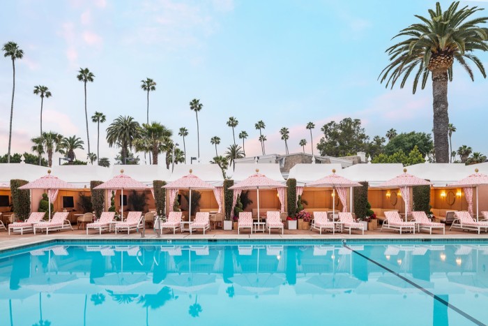 Dior’s coral loungers by the pool at the Beverly Hills hotel