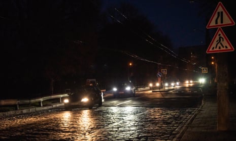 A dark street in Lviv amid a blackout after missile attacks on power infrastructure