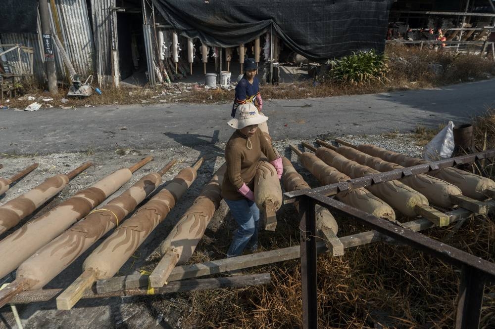 Joss sticks being dried. — Picture by Shafwan Zaidon