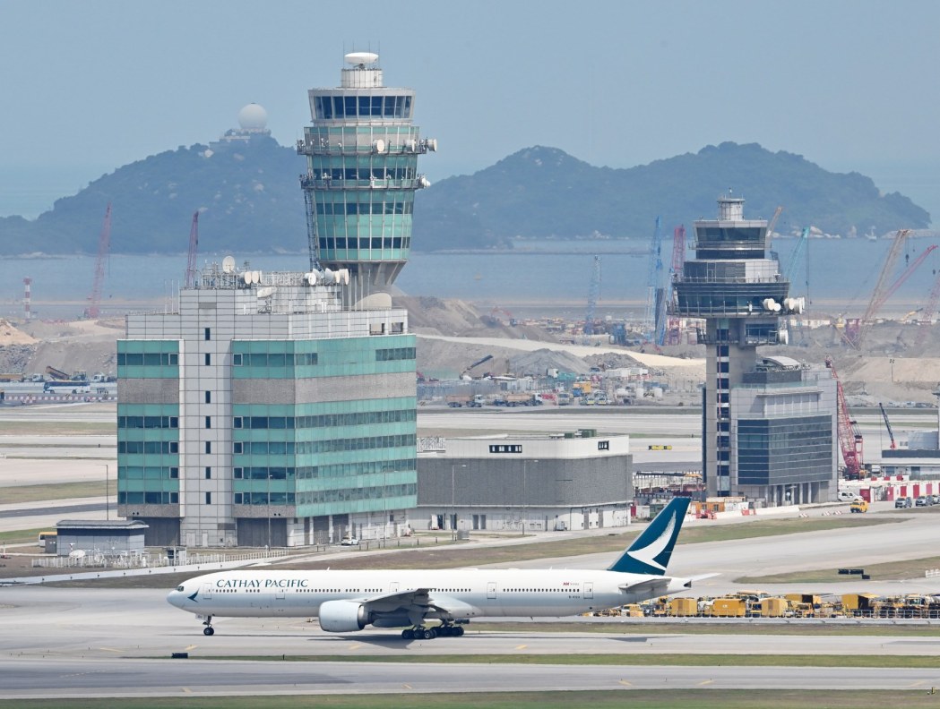 Cathay Pacific airplane Hong Kong International Airport flight