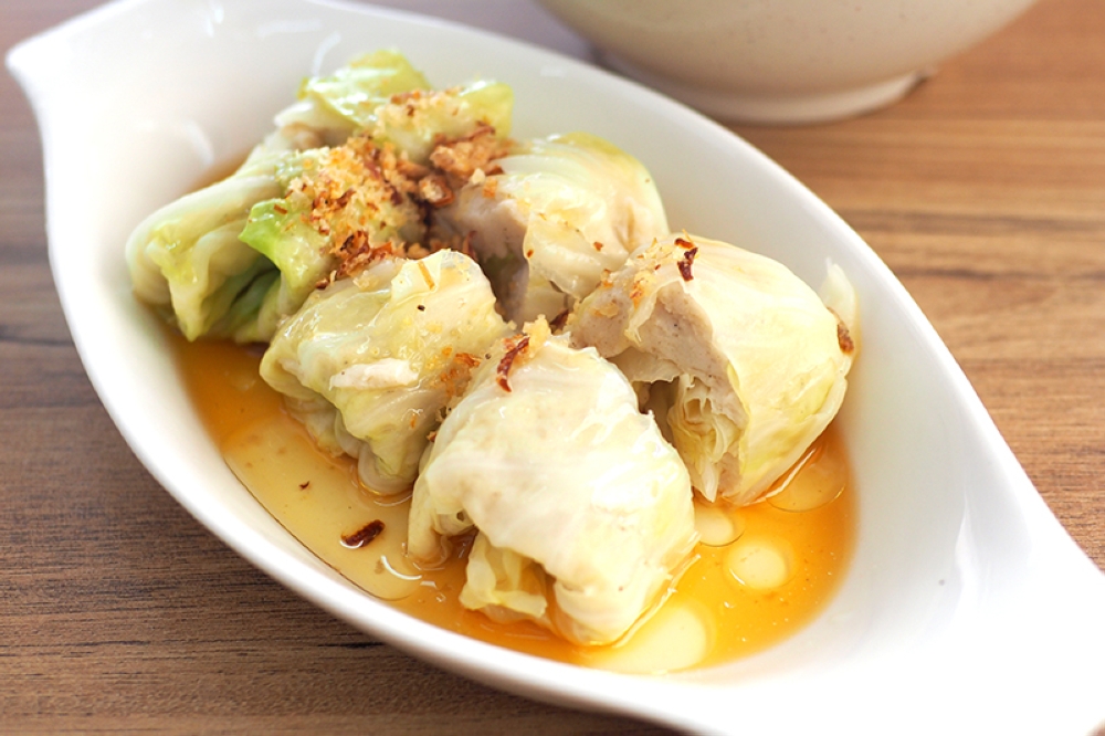 For an unusual twist, go for the cabbage rolls stuffed with fish paste
