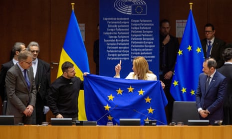 Zelenskiy addresses European Parliament in Brussels.