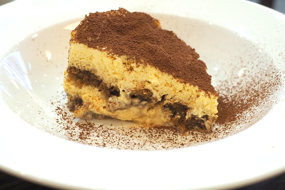 Tiramisu here is my go-to dessert with its coffee soaked sponge and creamy mascarpone.