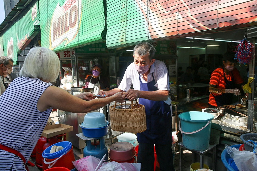 Goh who runs the Penang prawn mee stall is the longest resident here with 42 years at Restoran Gembira.