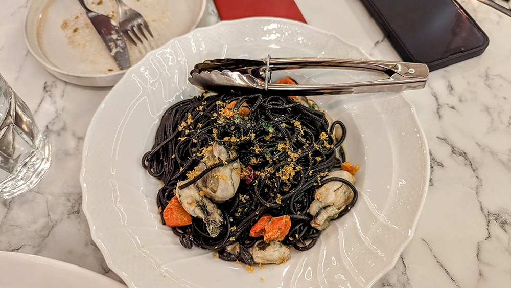 Plump Japanese oysters feature in the Squid Ink Tagliolini, with a dusting of grated bottarga.