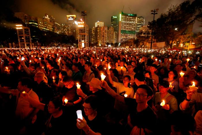 Thousands of people attend a candlelight vigil for victims of the 1989 Tiananmen Square massacre on its 30th anniversary in 2019, the last year it was commemorated in Hong Kong