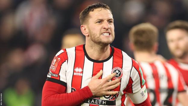 Billy Sharp celebrating his final Sheffield United goal against Wrexham in the FA Cup in February