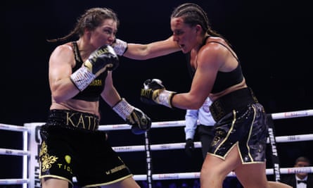 Chantelle Cameron lands a right on Katie Taylor.