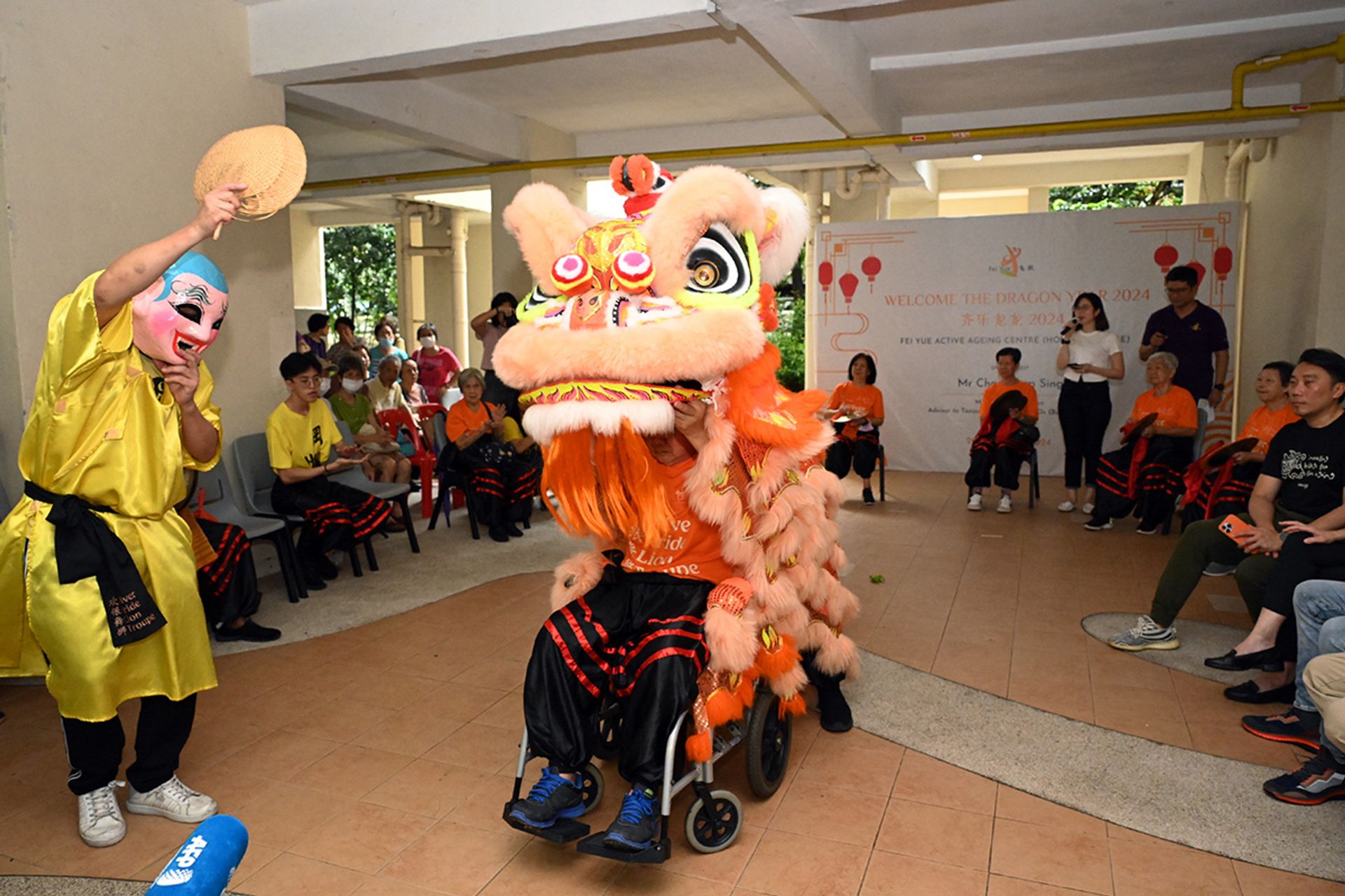 Mr Tan Sung Ming performing as the lion head during the debut show of the Silver Pride Lion Troupe, Singapore’s first lion dance group for seniors, in Holland Close on Jan 20, 2024.