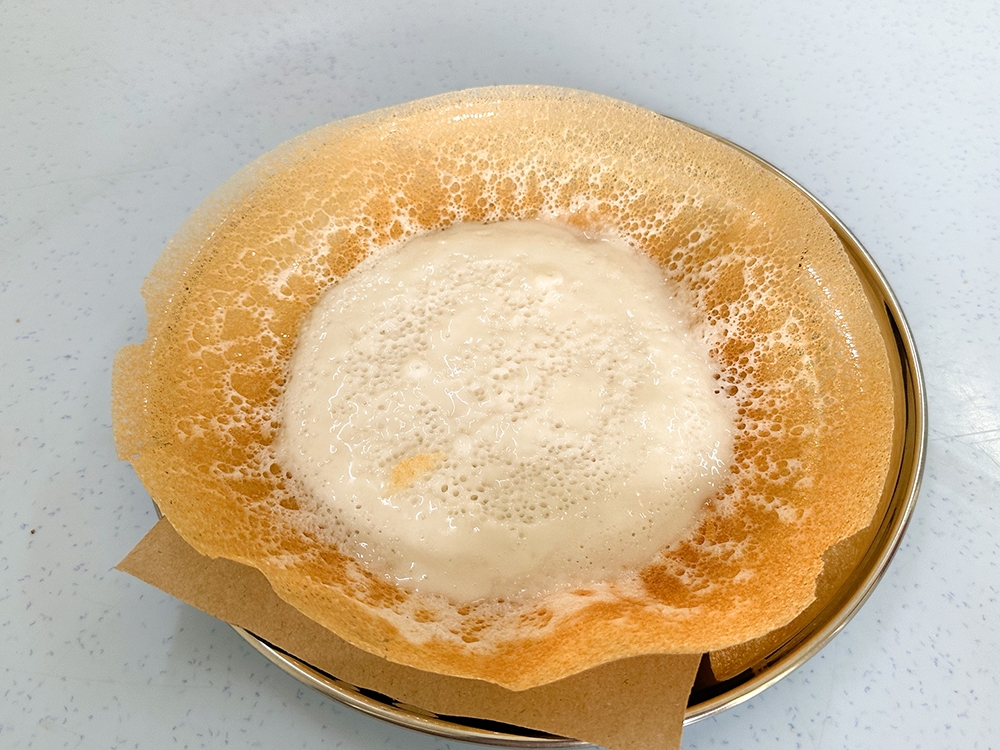 The glorious Paal Appam or the OG of 'appams' will win you over for sure