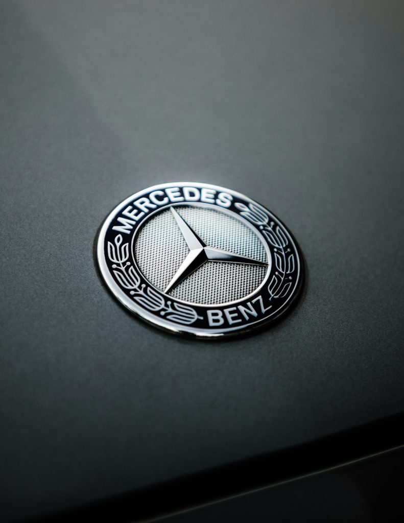 Mercedes-Benz logo on car, concept of tuning.