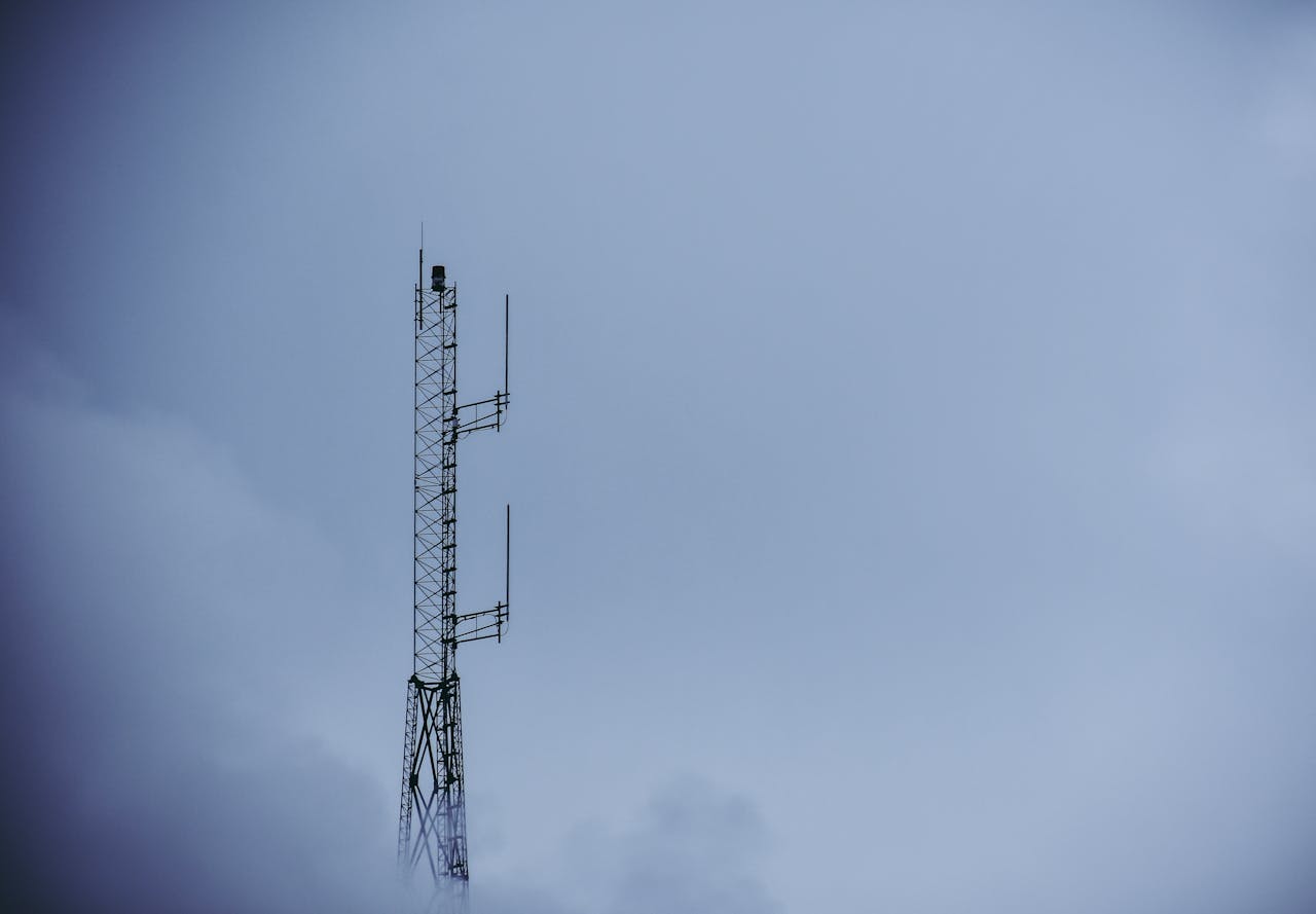 Black Metal Tower Under Gray Sky