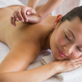 brunette-enjoying-peaceful-massage-with-eyes-closed-less brunette-enjoying-peaceful-massage-with-eyes-closed-less