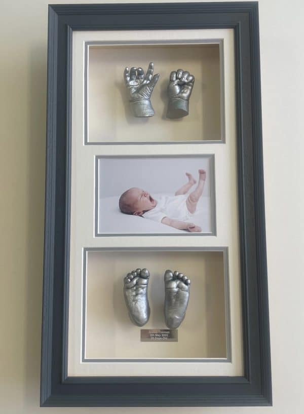 all hands and feet with photo & plaque