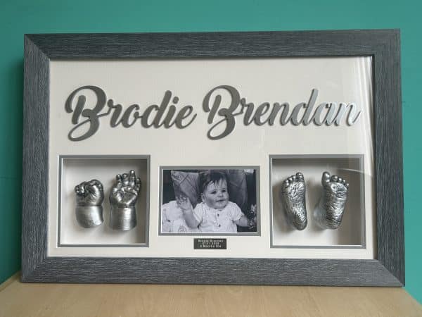 4 baby cast frame with photo and name