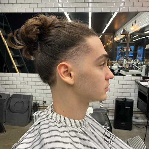Herrfrisyrer Långt hår med taper fade