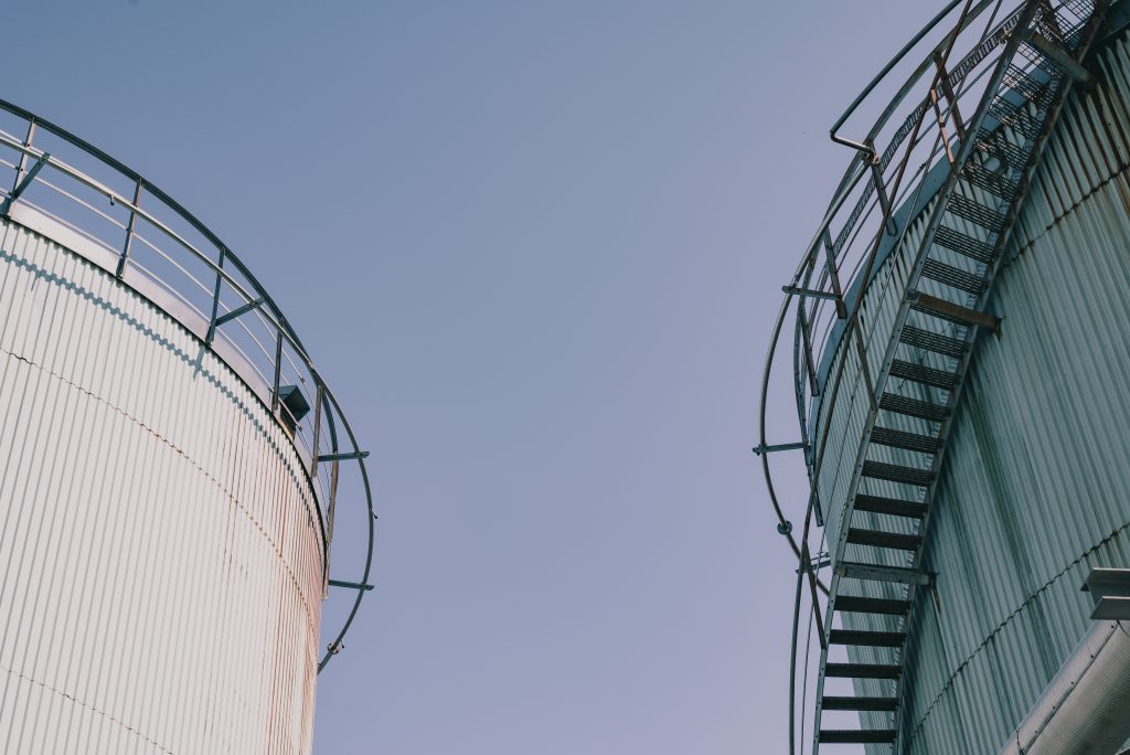 Image of cisterns with sky in the background